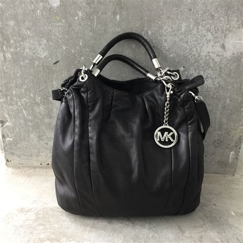 michael kors leather bag review|Michael Kors genuine leather handbags.